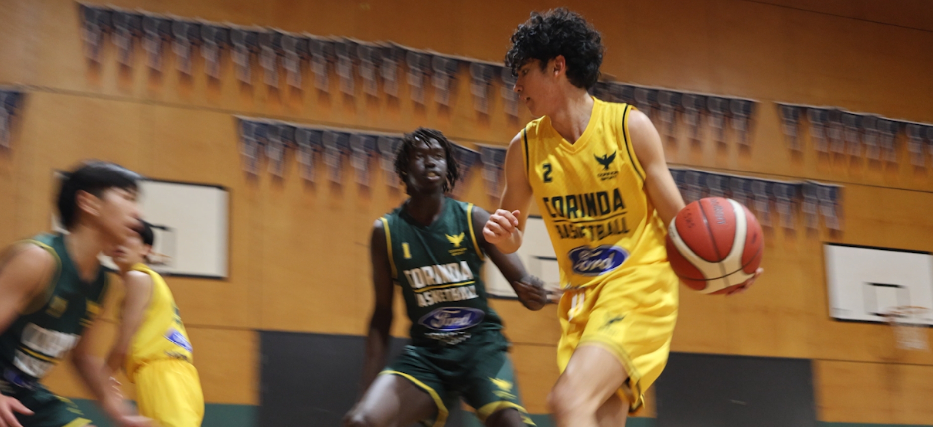Student playing basketball
